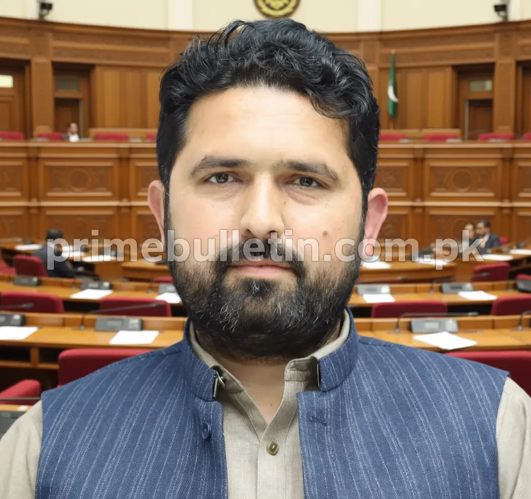 ohail Afridi, Chief Minister of Khyber Pakhtunkhwa, standing in front of KP Assembly symbolizing leadership and progress in 2025